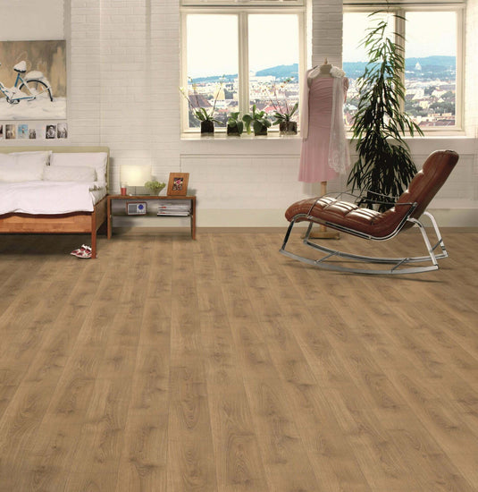 watermill oak plank laminate flooring displayed in a home