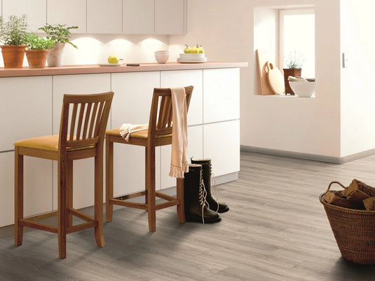 mountain grey oak plank laminate flooring displayed in a kitchen