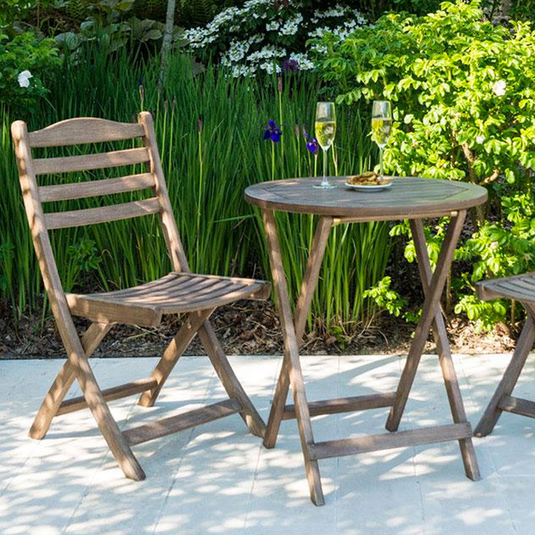 brown wooden tea for two set with 2 chairs and 1 round table