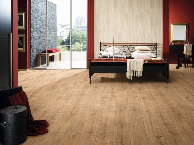 Load image into Gallery viewer, mira oak laminate flooring on display in a bedroom
