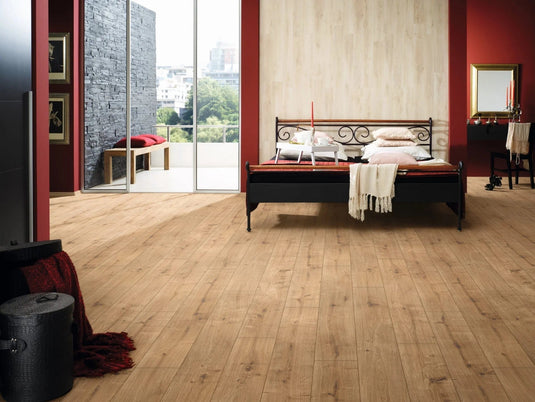 mira oak laminate flooring on display in a bedroom