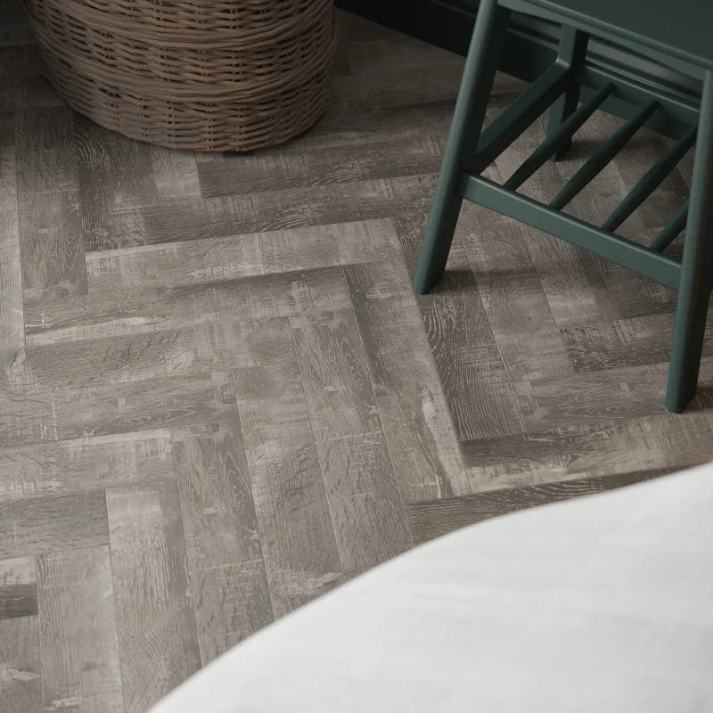 Load image into Gallery viewer, lundy limed oak herringbone laminate flooring on display in a home setting
