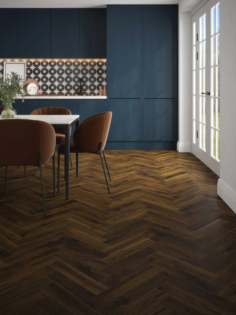 Load image into Gallery viewer, smoked cathedral oak herringbone laminate flooring displayed in a kitchen
