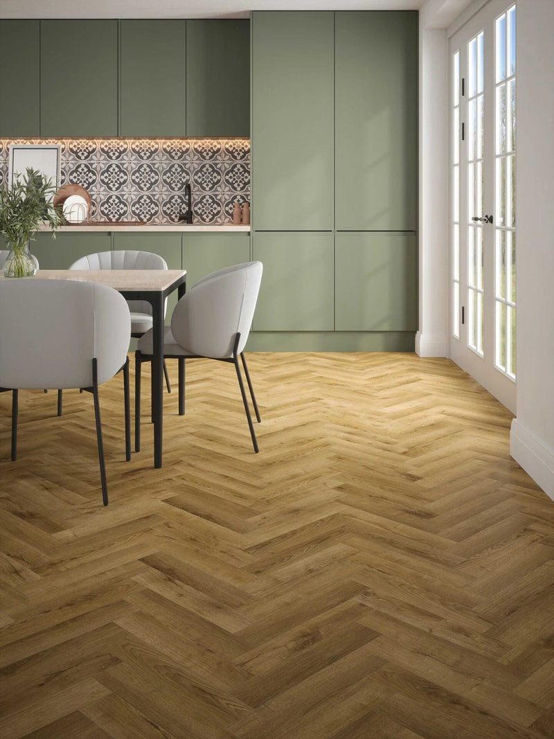 Załaduj obraz do przeglądarki galerii, stade oak herringbone laminate flooring displayed in a kitchen
