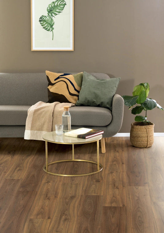 dark langley walnut aqua laminate flooring on display in a living room