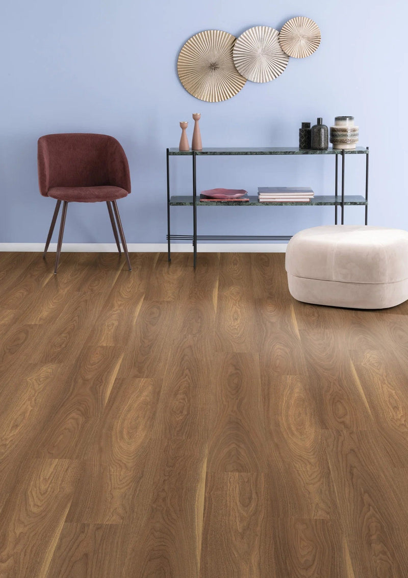 Load image into Gallery viewer, mansonia walnut laminate flooring on display in a living area
