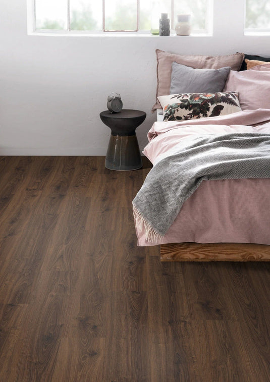 lasken oak laminate flooring on display in a bedroom