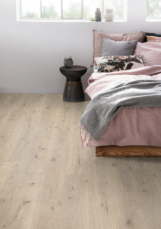 murom oak laminate flooring displayed in a bedroom