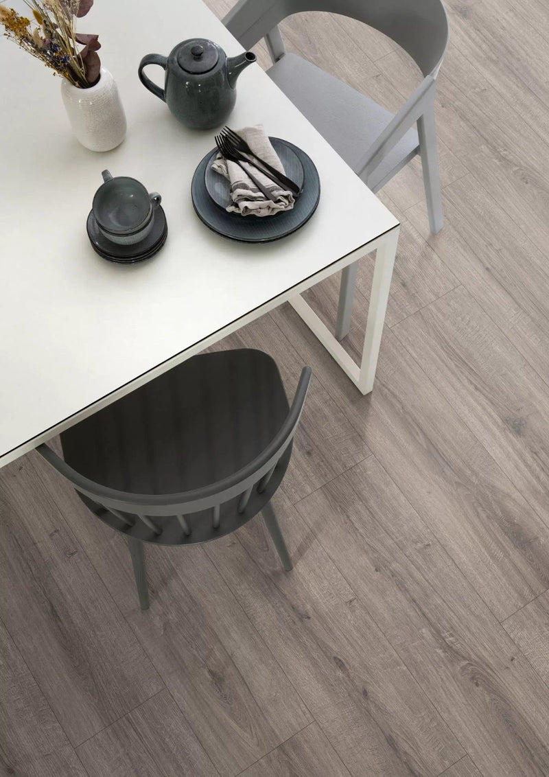 Load image into Gallery viewer, grey sherman oak large aqua laminate flooring on display in a kitchen
