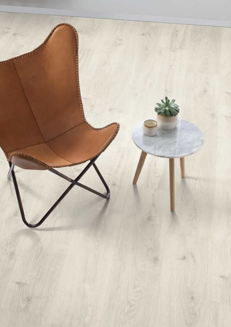 Load image into Gallery viewer, white bayford oak laminate flooring displayed in a home
