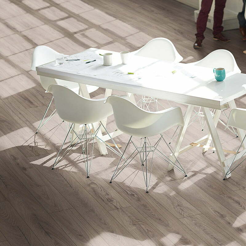 Load image into Gallery viewer, rutherford oak aqua laminate flooring displayed in a dining room
