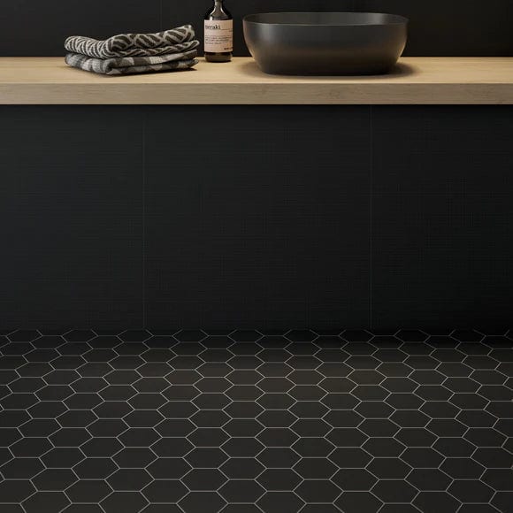 Load image into Gallery viewer, miniworx hexagon ral 1500 tile in matt black, 21x24cm as flooring
