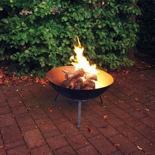 black steel firebowl with logs lighting