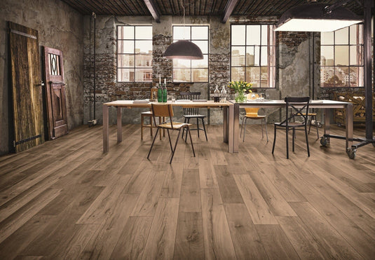 wild west oak long laminate flooring displayed in a dining room