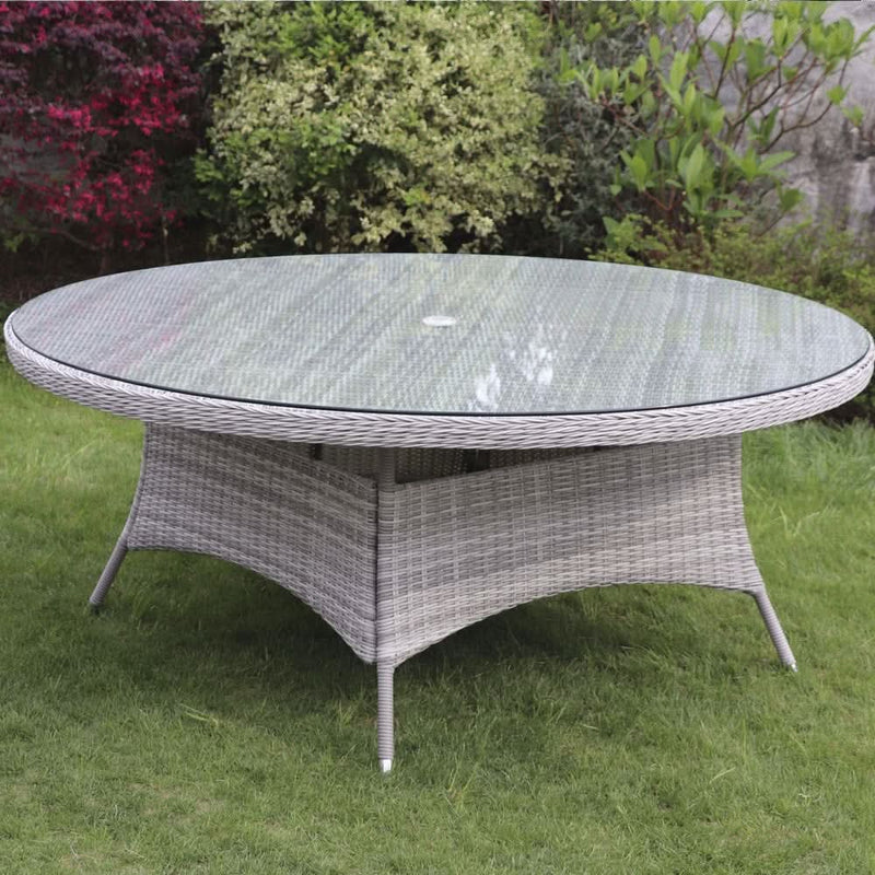 Load image into Gallery viewer, glass topped round table with hole for parasol centrally situated within the table
