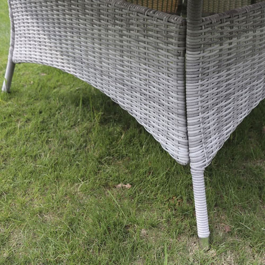 grey woven synthetic rattan underneath round table