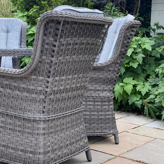 dark grey chairs with woven synthetic rattan