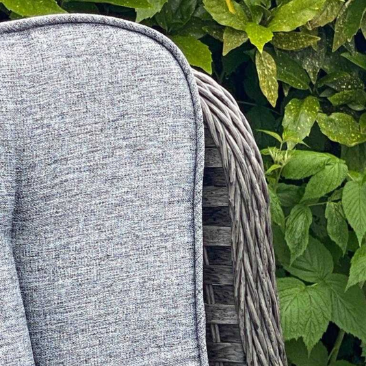 dark grey chair with grey back cushion