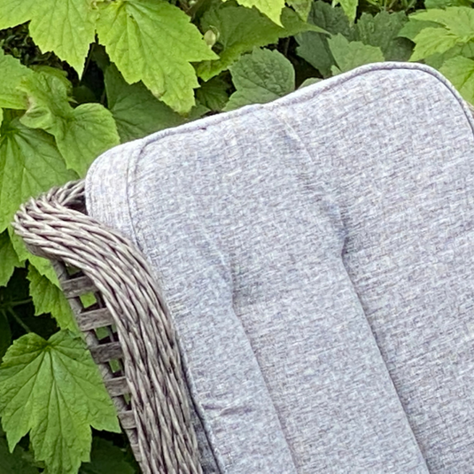 dark grey chair with grey back cushion