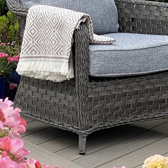 dark grey armchair with grey back and base cushions