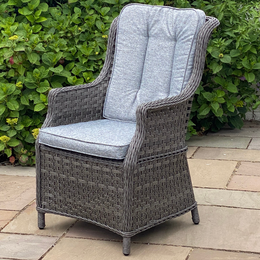 dark grey chair with cushions
