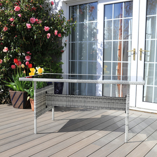 light grey rectangular table with glass top