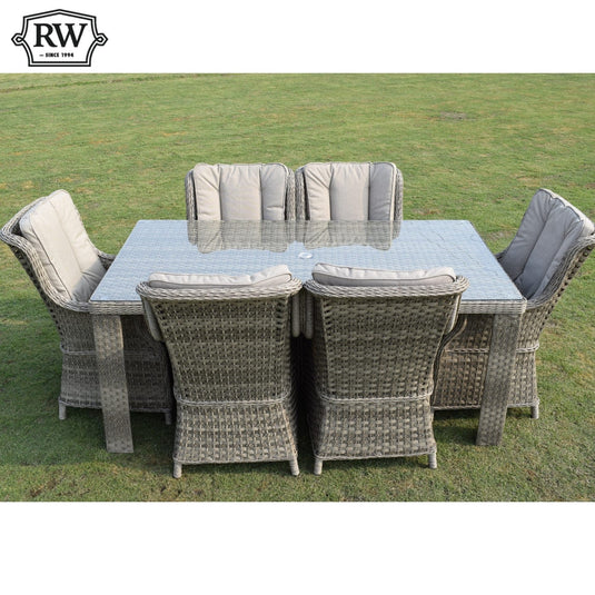 6 seater set with a rectangular glass topped table in a natural colour