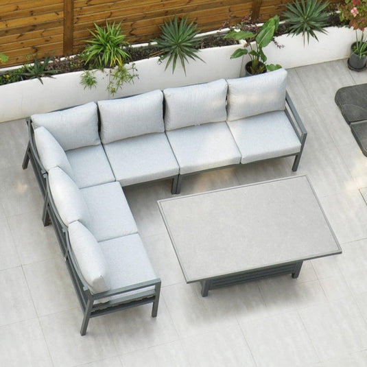 dark grey corner sofa with grey back and base cushions & dark grey rectangular table