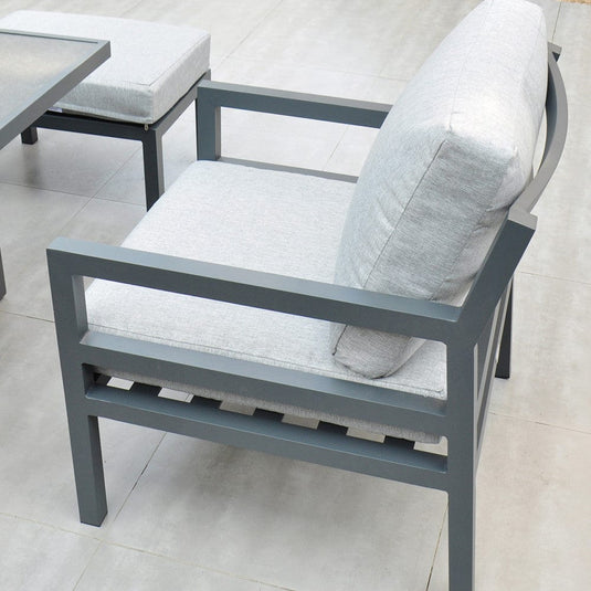 dark grey armchair with grey back and base cushions