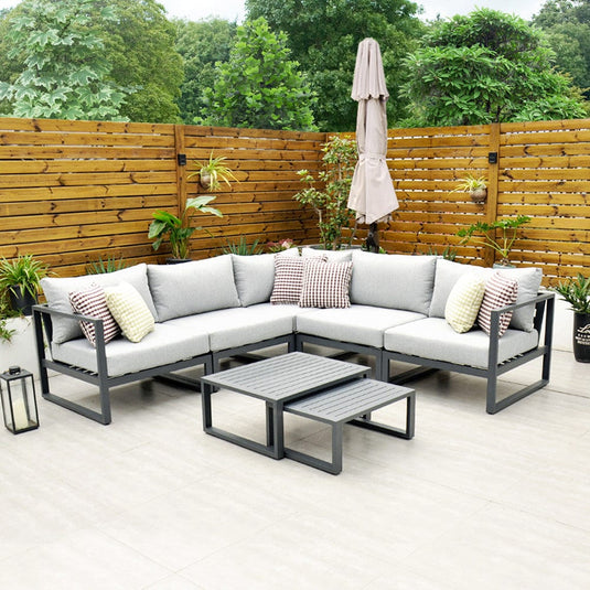 dark grey garden furniture set with 2 small rectangular tables