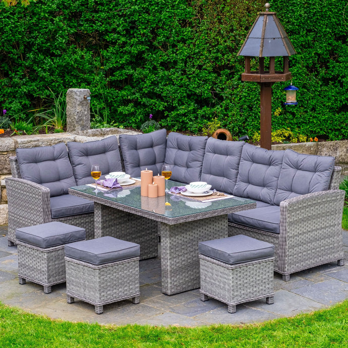 grey corner sofa set with rectangular glass topped table and 3 stools