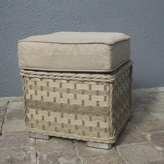 stool in a natural colour with a sand coloured cushion
