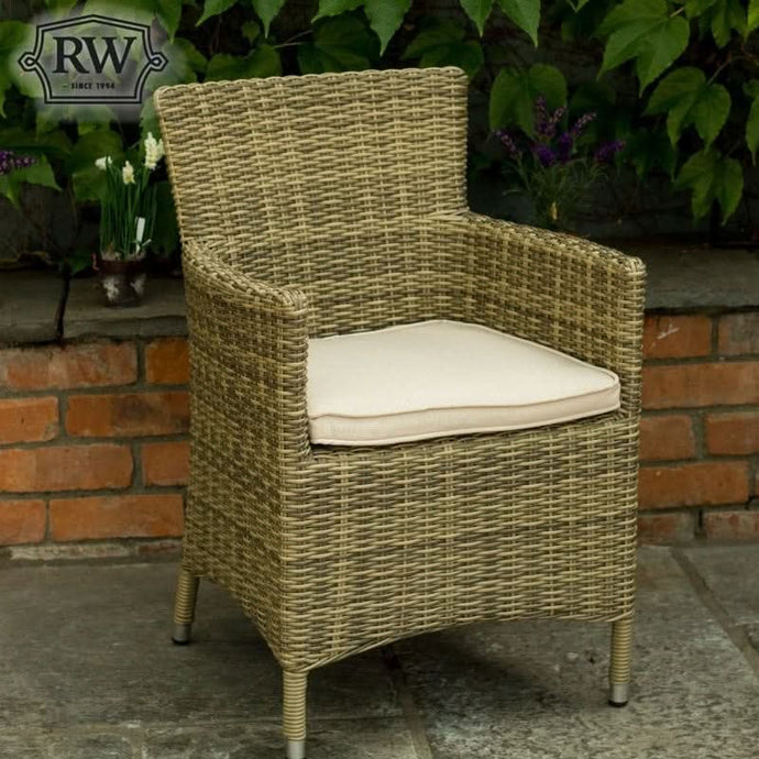 armchair in a natural colour with 1 beige base cushion