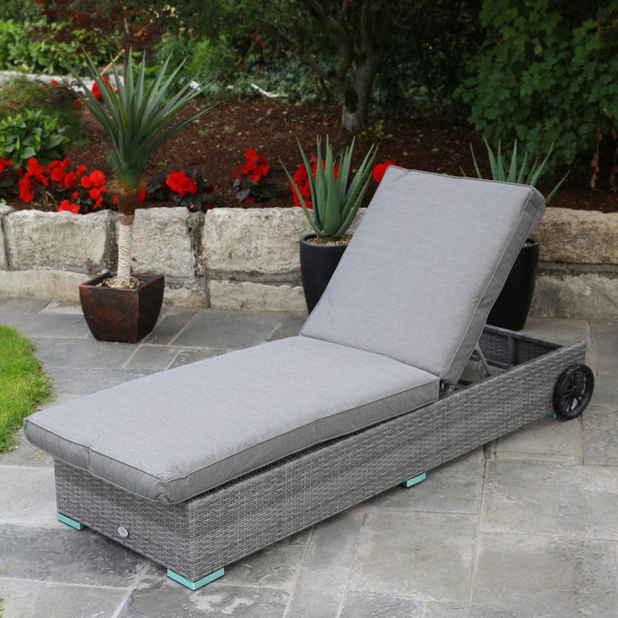 grey sun lounger with adjustable height and wheels on the back legs for easy movement