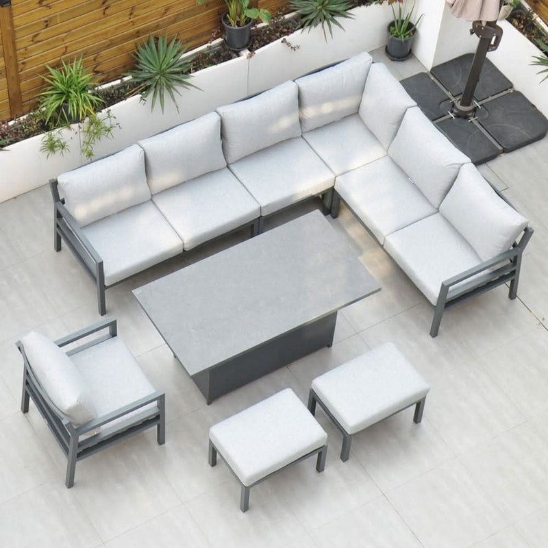 Załaduj obraz do przeglądarki galerii, dark grey corner sofa set with rectangular rising table, 1 armchair and 2 stools
