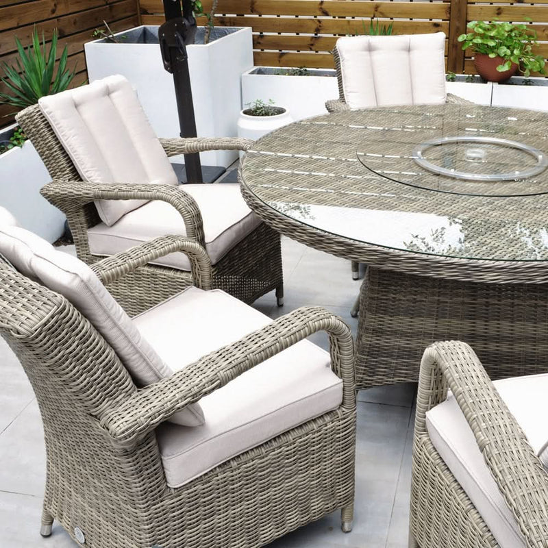 Load image into Gallery viewer, 6 seater round set with a glass topped round table in a natural colour
