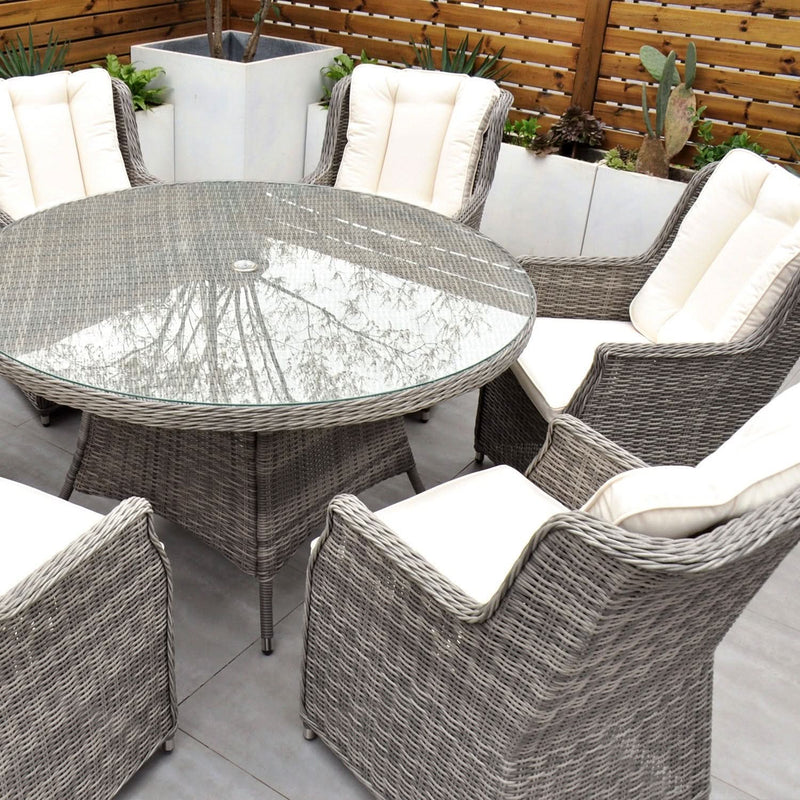 Load image into Gallery viewer, light grey 8 seat set with cream cushions and a 170cm glass topped round table
