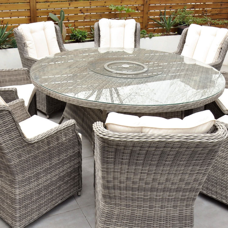 Load image into Gallery viewer, light grey 8 seat set with cream cushions and a 170cm glass topped round table
