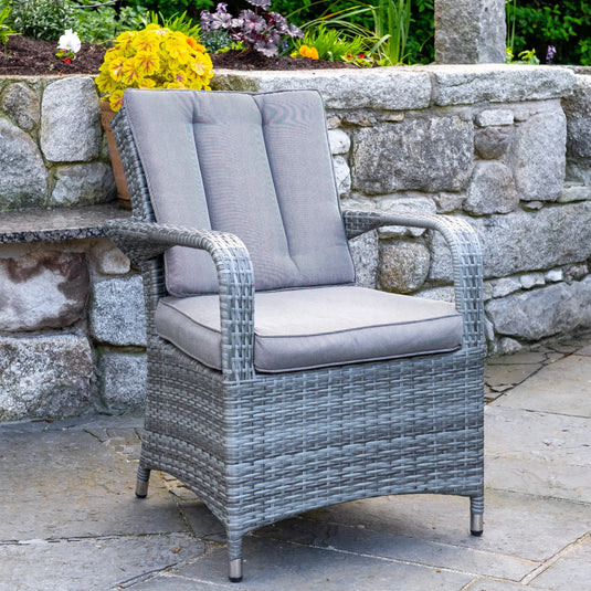 light grey woven synthetic rattan armchair with grey back and base cushions