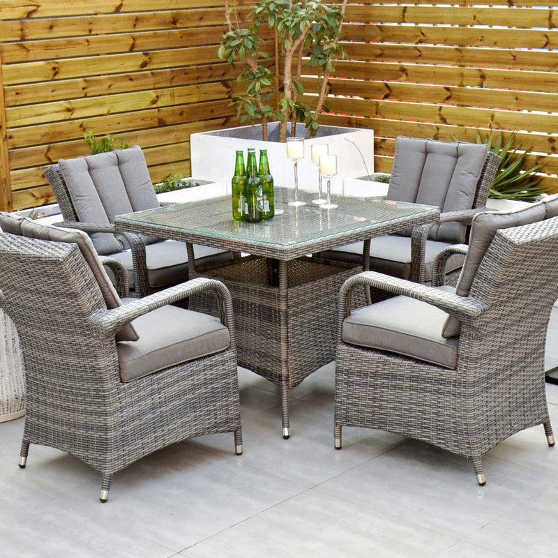 Load image into Gallery viewer, grey 4 seater set with glass topped square table 
