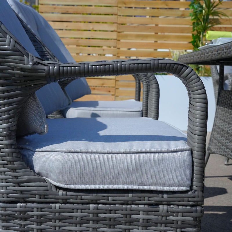 Load image into Gallery viewer, side view of the grey chair with cushions
