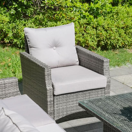 grey armchair with light grey back and base cushions